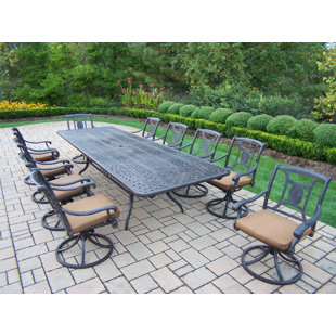 Go to store & view more images Victoria 11 Piece Dining Set with Cushions by Oakland Living