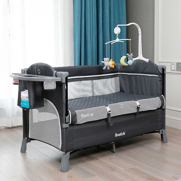 baby crib attached to bed