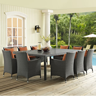 Go to store & view more images Tripp 11 Piece Dining Set with Sunbrella Cushions by Brayden Studio
