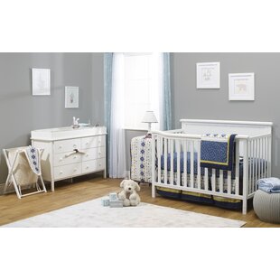 white crib and dresser set