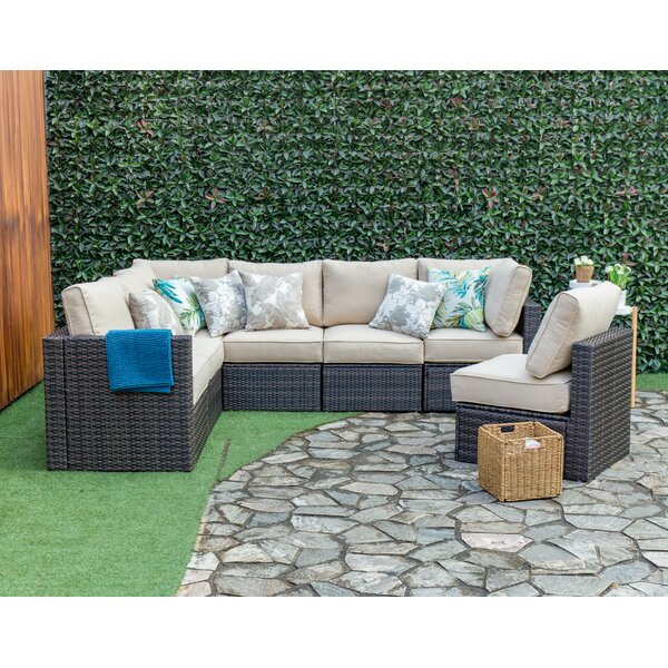 Sours Outdoor 7 Piece Sectional Seating Group with Cushions