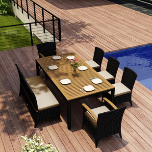Go to store & view more images Holbrook 7 Piece Teak Dining Set with Sunbrella Cushions by Rosecliff Heights