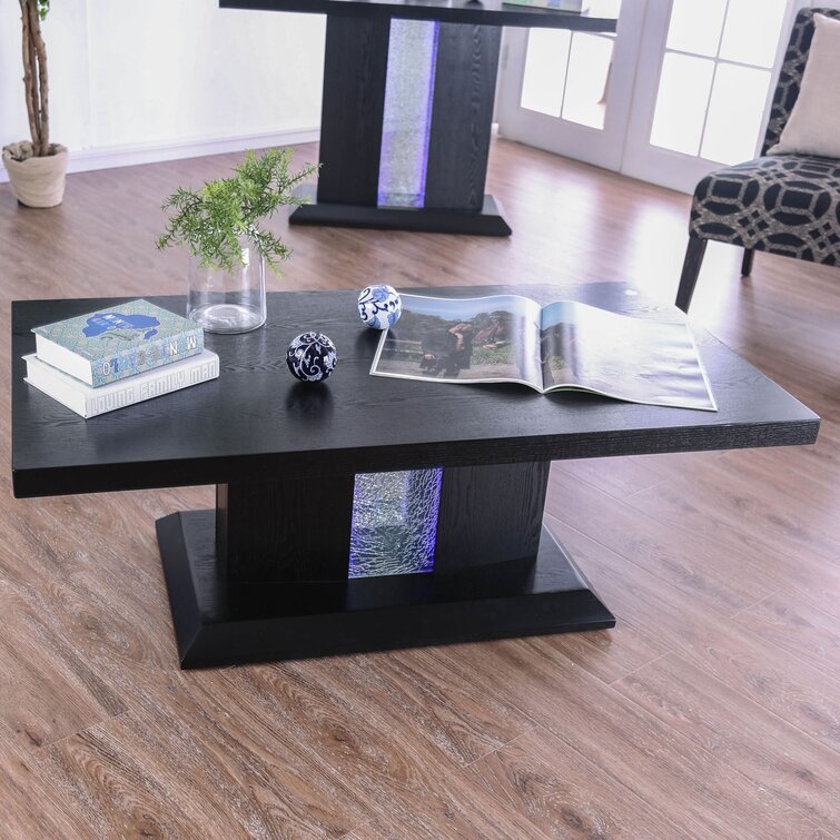 pedestal coffee table orren ellis