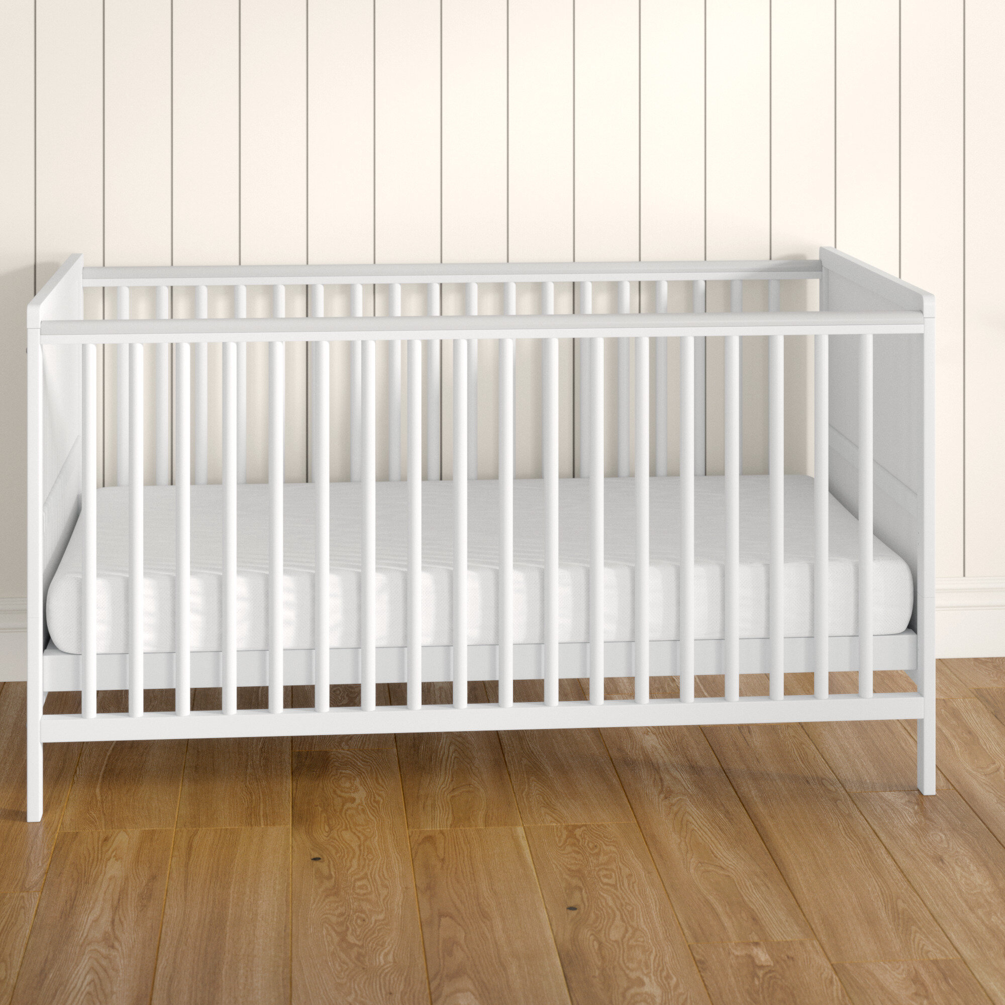 white wooden cot bed with mattress