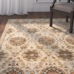 Mcdowell Hand-Tufted Tan Area Rug