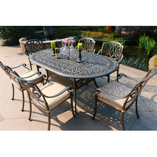 Go to store & view more images Baptiste Aluminum 7 Piece Sunbrella Dining Set with Sunbrella Cushions by Canora Grey