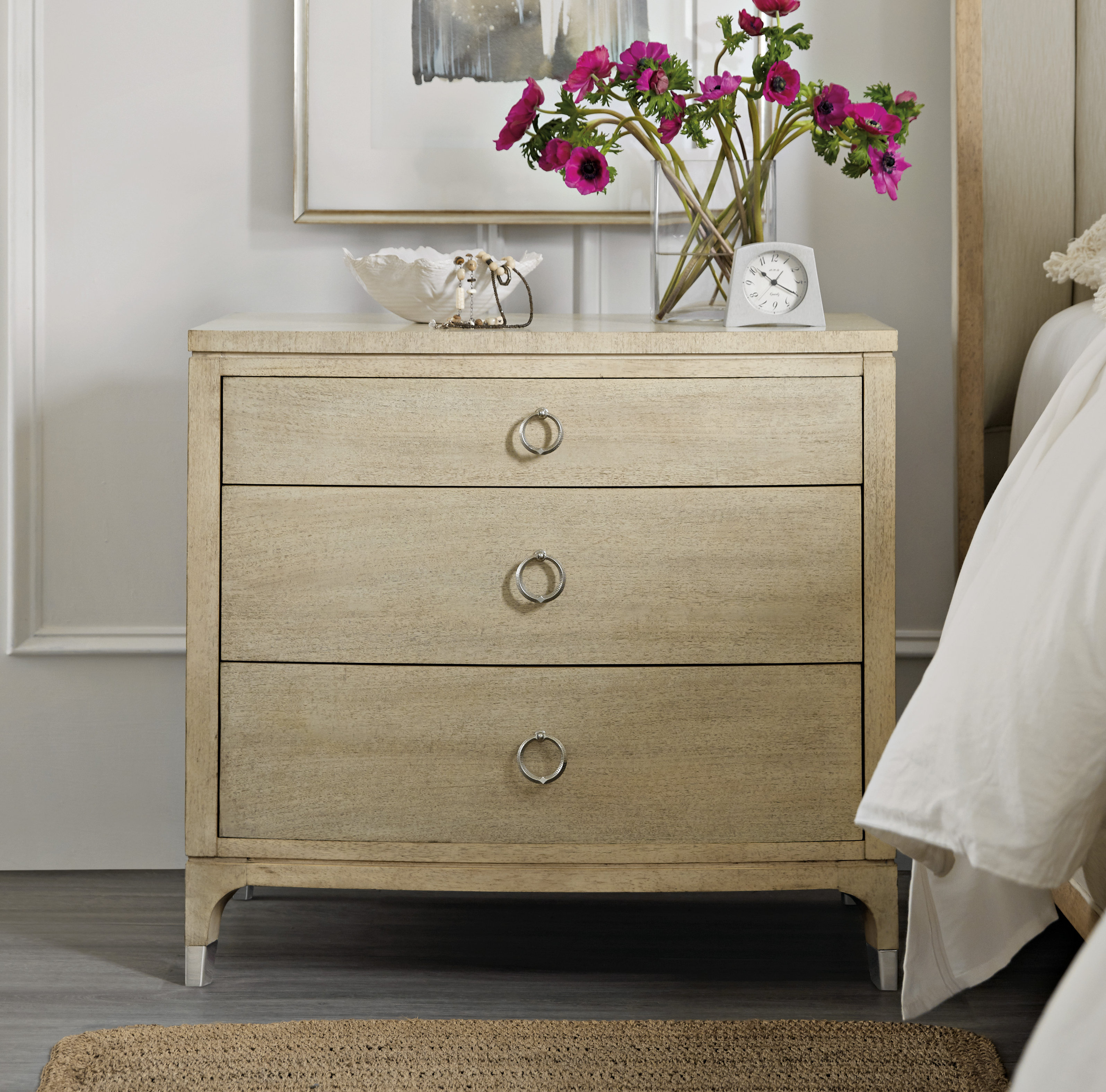 cream dresser and nightstand