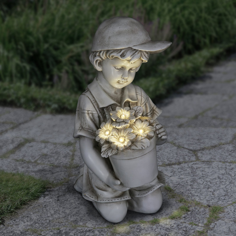 August Grove Sentimental Stone Solar Boy With Flower Pot Garden Statue Wayfair Shop wayfair for garden to match every style and budget. sentimental stone solar boy with flower pot garden statue