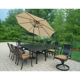 Go to store & view more images Vanguard 11 Piece Dining Set with Cushions by Oakland Living