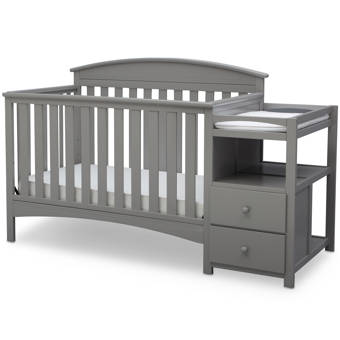 black crib with changing table