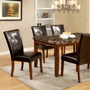 Go to store & view more images Fleur De Lis Living Gowan Dining Table