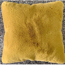 yellow furry pillow