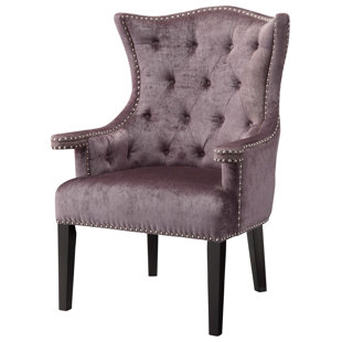 Go to store & view more images Crestview Collection Fifth Avenue Eggplant Velvet Wingback Chair with Nailhead Trim