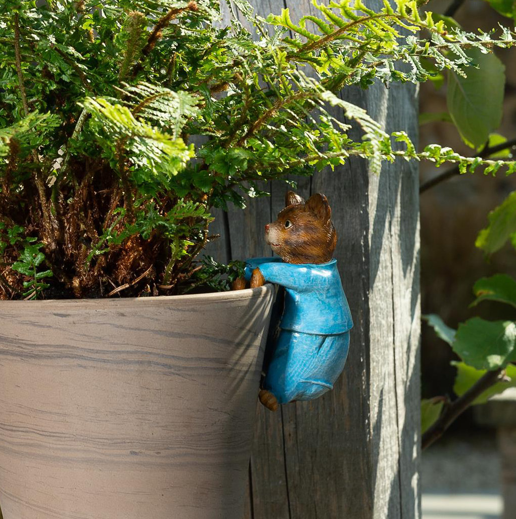 Happy Larry Blumentopffigur Meuric