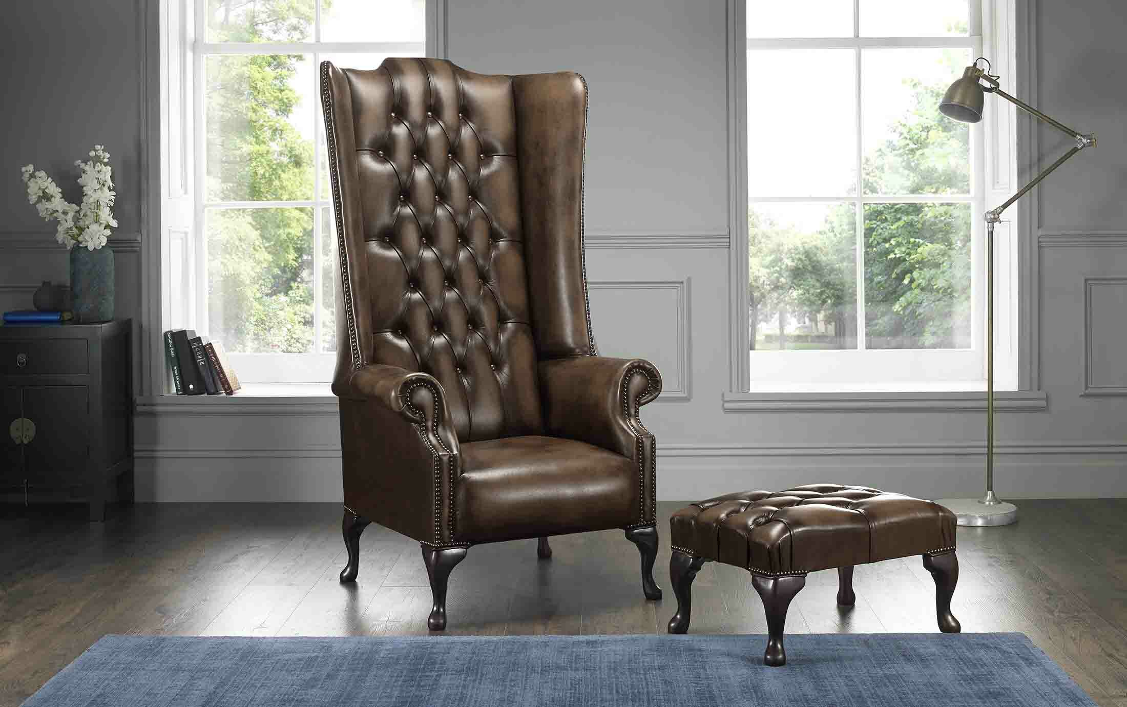 colucci high back wing chesterfield chair and footstool