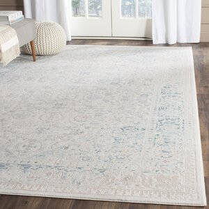 Auguste Turquoise/Ivory Area Rug