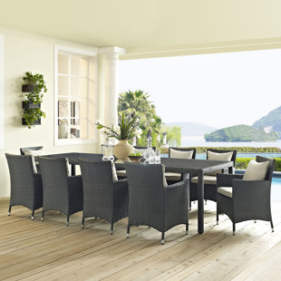 Go to store & view more images Tripp Outdoor Patio 11 Piece Dining Set with Sunbrella Cushions by Brayden Studio
