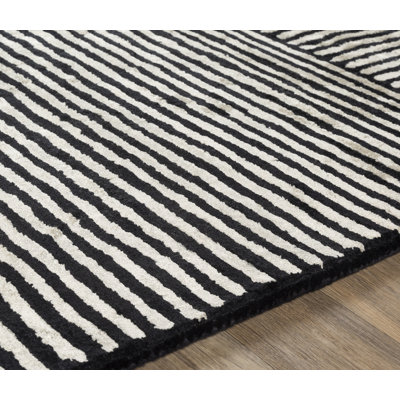 AllModern Balos Handmade Viscose Black/Ivory Rug & Reviews | Wayfair