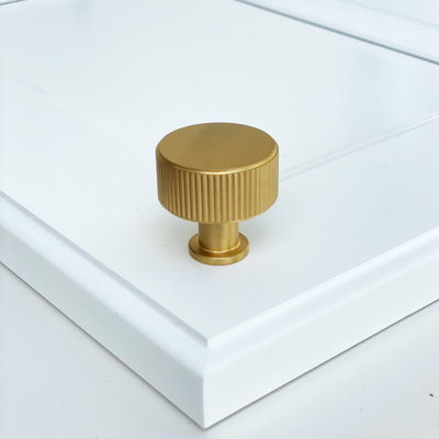 Lines 1-1/4" Diameter Round Knob in Satin Brass