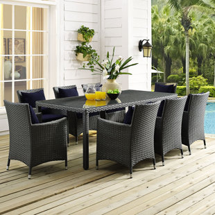 Go to store & view more images Tripp 9 Piece Dining Set with Sunbrella Cushions by Brayden Studio