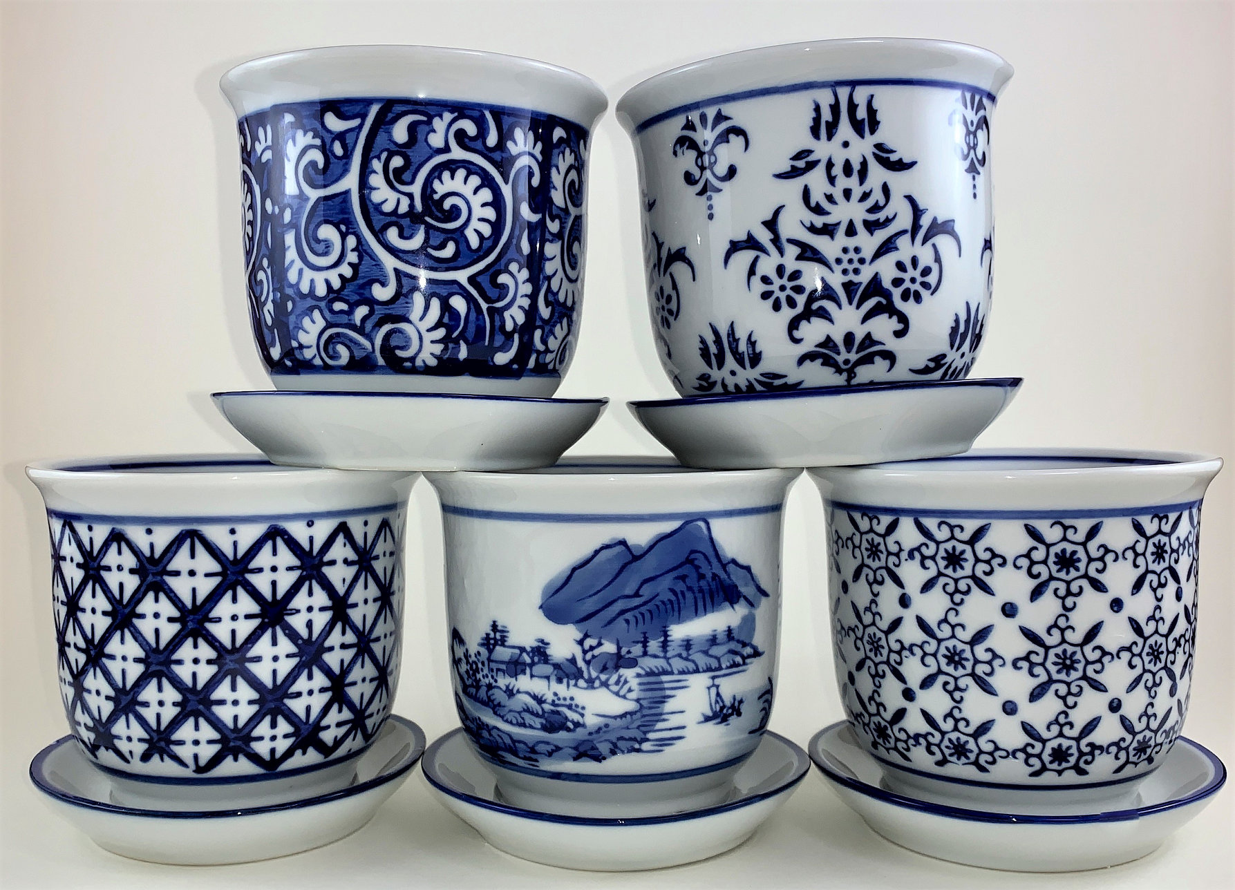World Menagerie Levent 5 Piece Porcelain Pot Planter Set Wayfair 5 Piece Porcelain Pot Planter Set