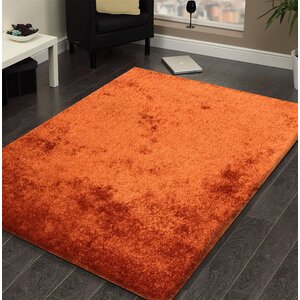 Arriaga Hand Tufted Rust Area Rug