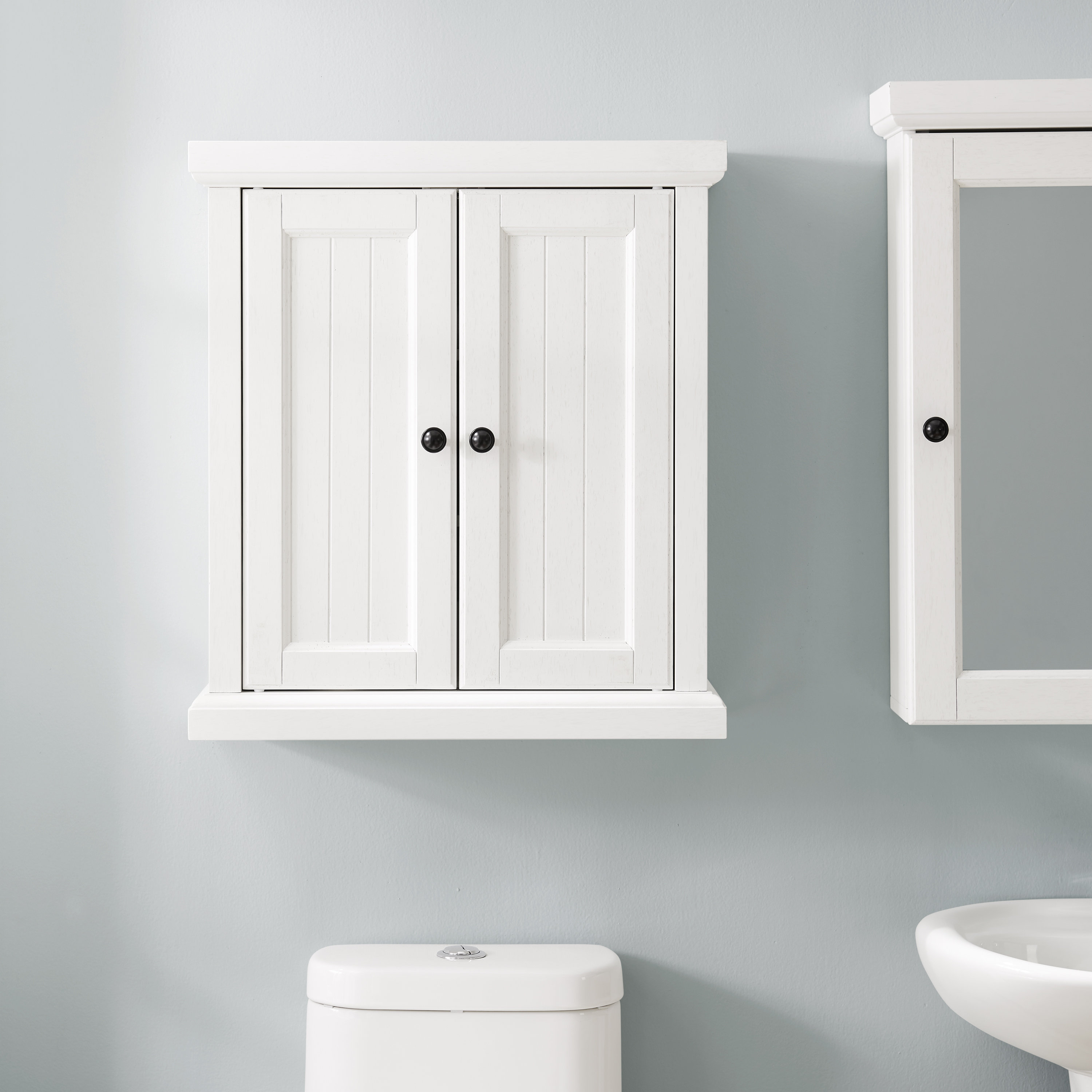 white bathroom cabinet wall