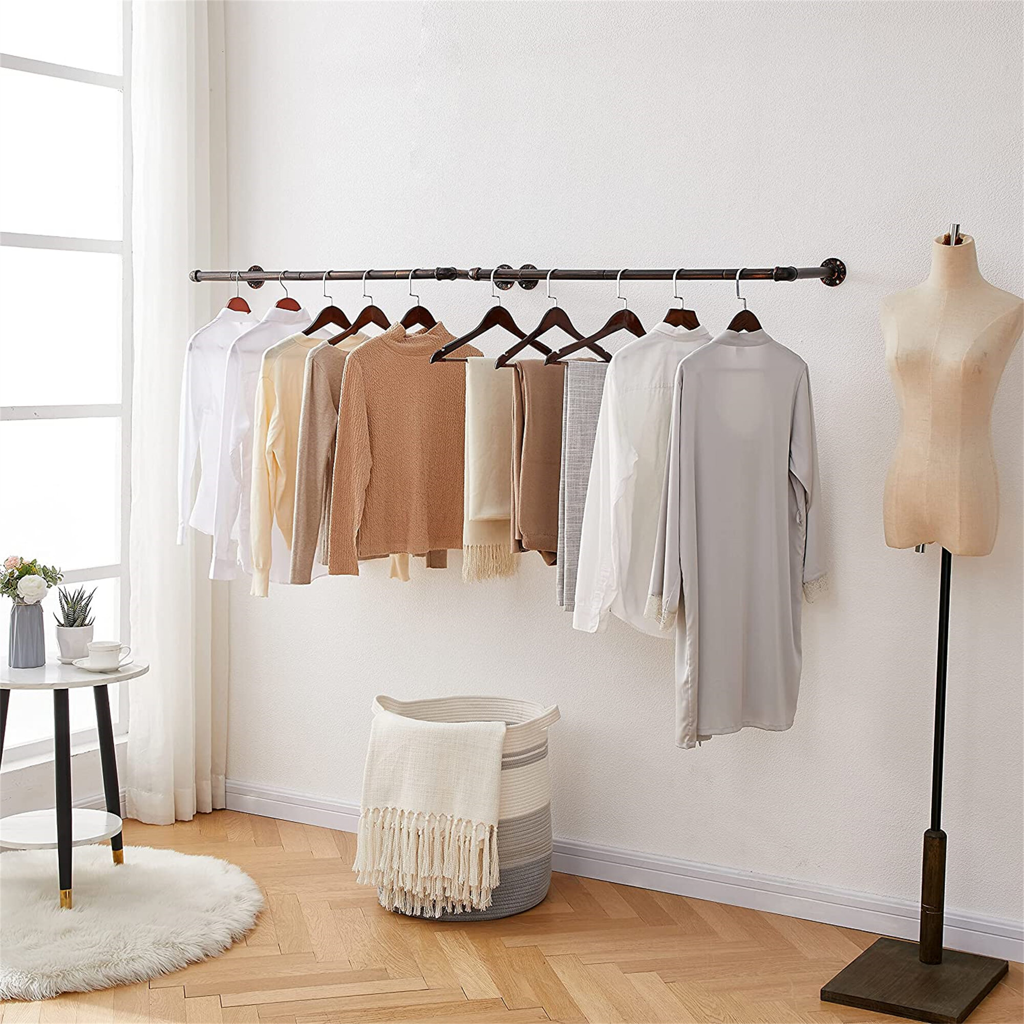 Minimalistic Clothes Rack Garment Rail made of metal mounted on the ceiling Ceiling Clothing rack