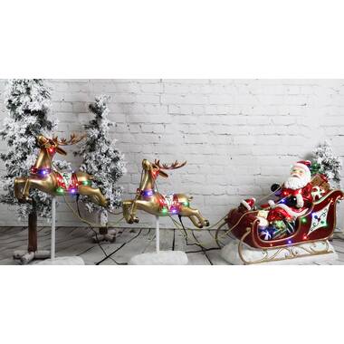 Santa’s sleigh and reindeer metal mantle decor
