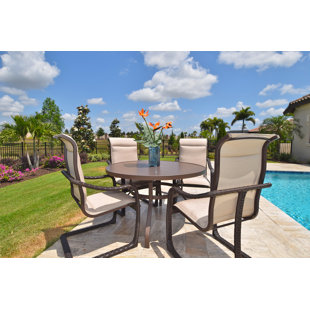 Go to store & view more images Palms 5 Piece Dining Set by Outdoor Masterpiece