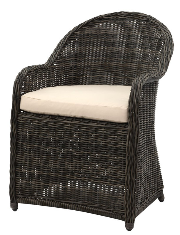 A beautiful Kubu wicker chair with creamy cushion works in a living room, dining room, or breakfast area of a kitchen. #wickerchair #kubu #patiochair
