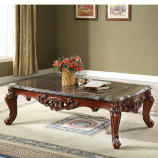 Go to store & view more images Anner Traditional Rectangular Wood and Marble Coffee Table by Astoria Grand