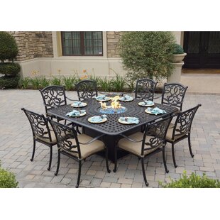 outdoor dining table with fire pit center