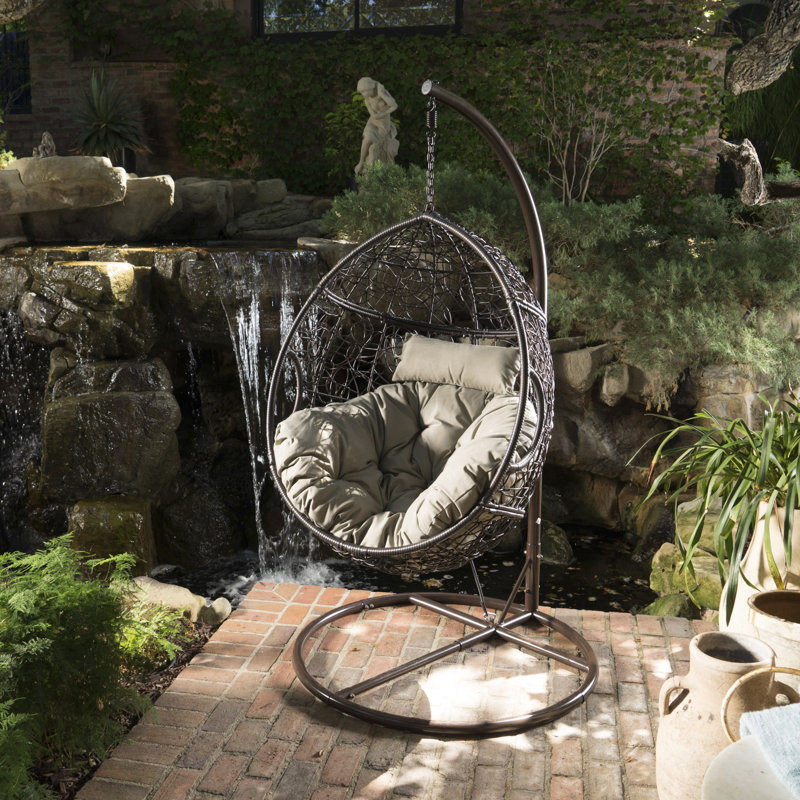 Outdoor wicker basket swing chair with stand clearance