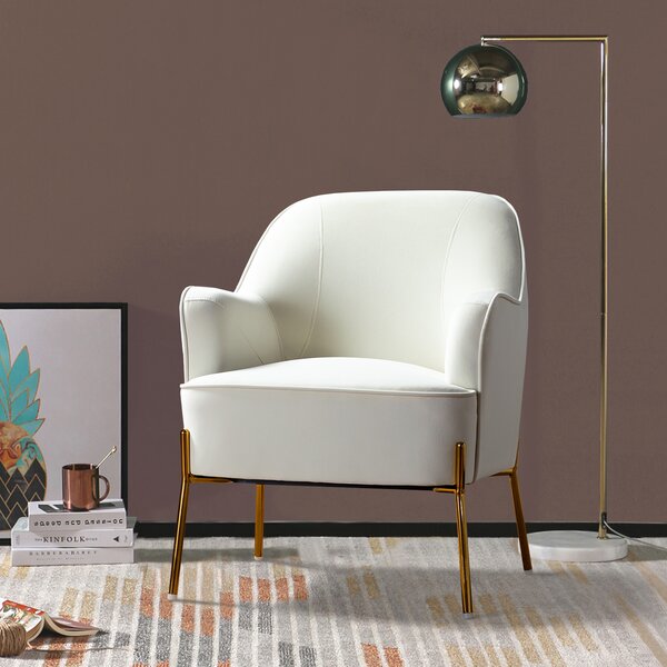 white chair with gold legs