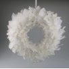white wreath with feathers