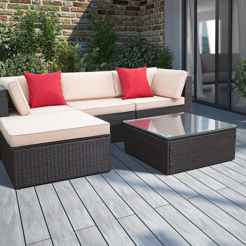 Huang 5 Piece Rattan Sectional Seating Group with Cushions