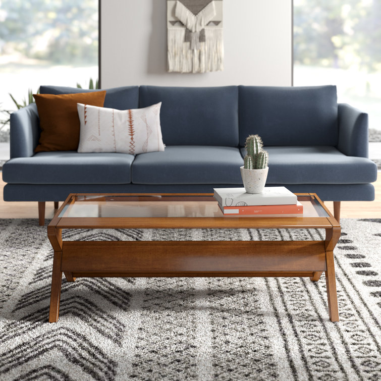 Wade Logan® Desi 4 Legs Coffee Table with Storage & Reviews Wayfair