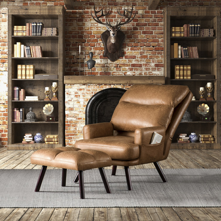 leather and wood lounge chair with ottoman