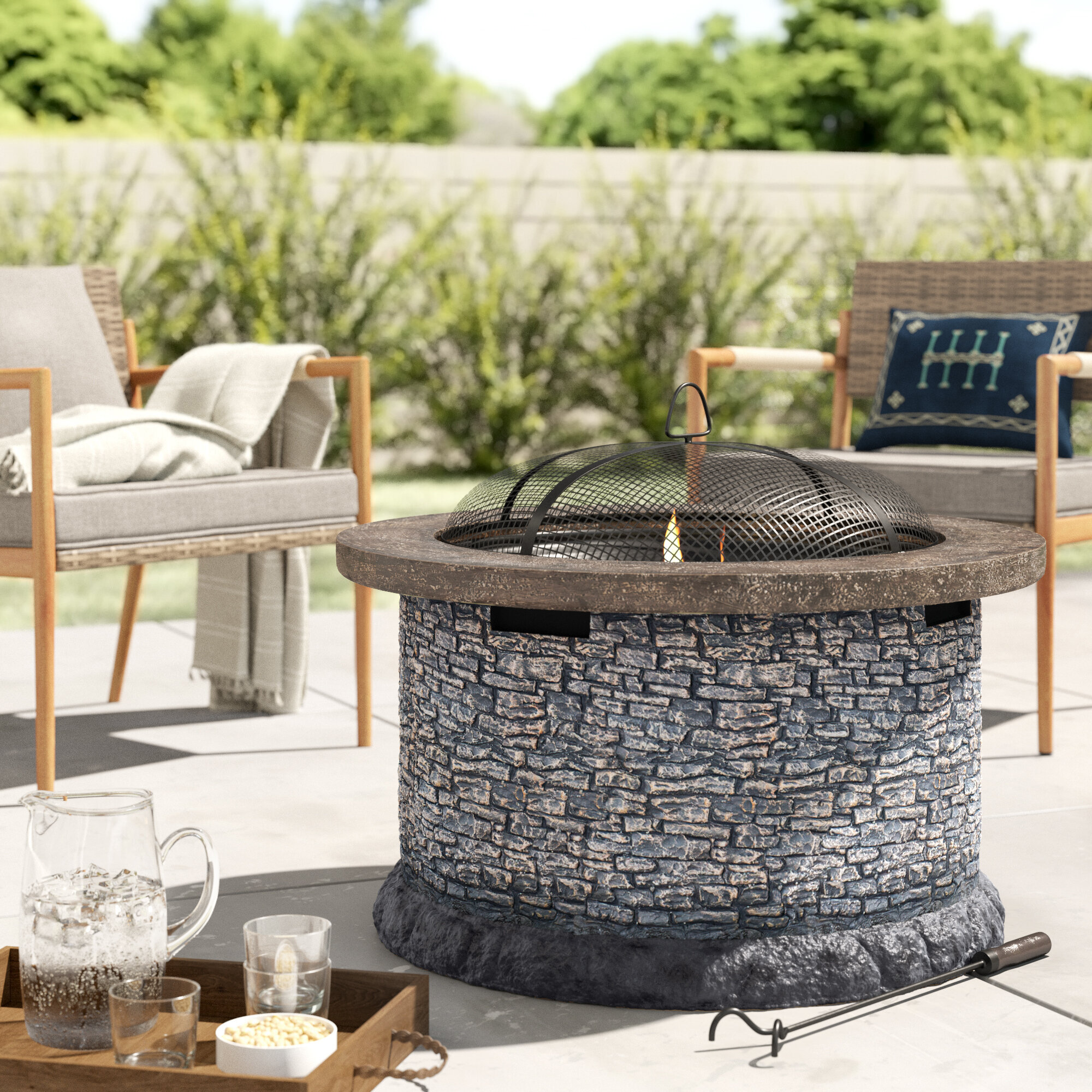 patio set with wood burning fire pit