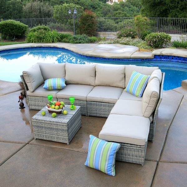 Goulding 7 Piece Rattan Sectional Seating Group with Cushions