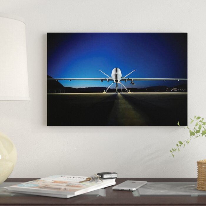 An Mq 9 Reaper Sits On The Flight Line Graphic Art Print On Canvas