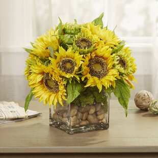 fake sunflowers in vase