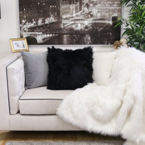 black fluffy pillows