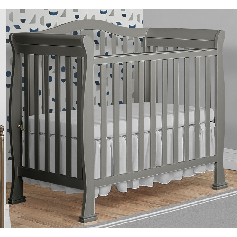 grey mini crib