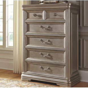 Go to store & view more images Fleur De Lis Living Goldberg 5 Drawer Chest