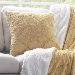 gold furry pillow