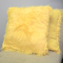 yellow furry pillow