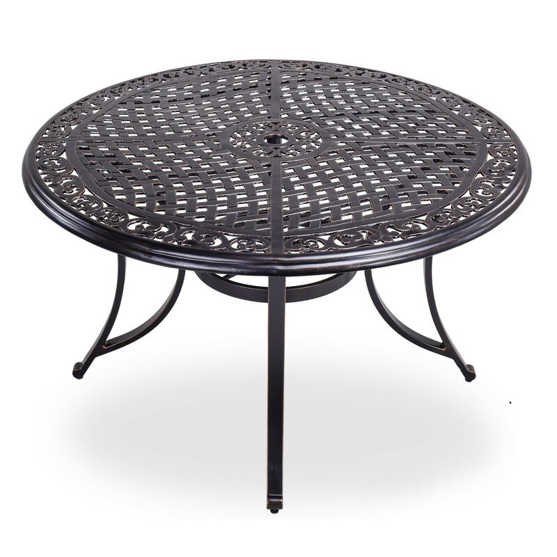 patio table with umbrella hole and chairs