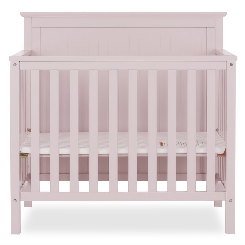 mini crib with changing table